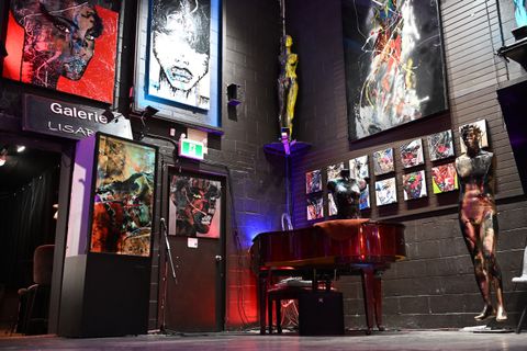 Gallery view of finished paintings displayed together