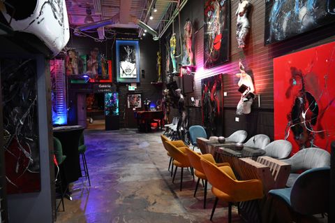 Guests enjoying bubbles before starting their canvas